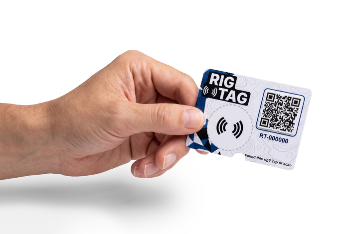 A Rig Tag card held in one hand, showing its size